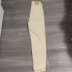 Cream High-Waisted Jeans